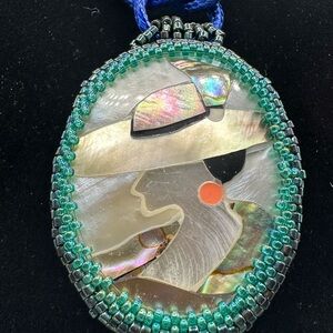 Elegant Mother of Pearl Intarsia Pendant with Green Tones of Glass Bezel Beading